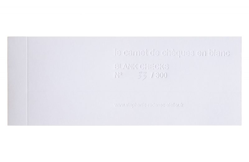 le carnet de chèques en blanc